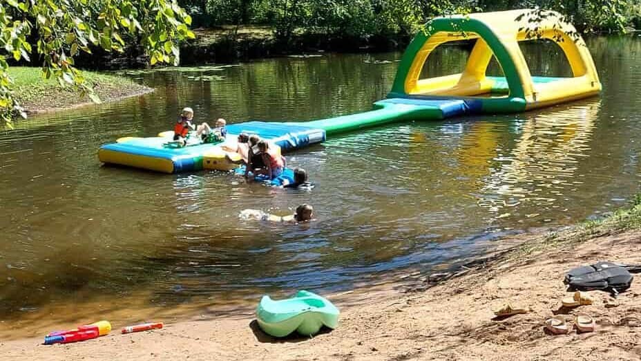 Kids Play In The Spring Fed Pond At Winding River Campground